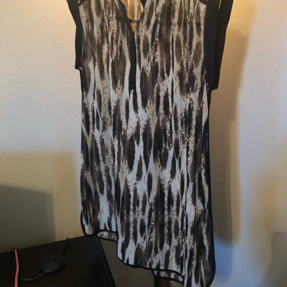 Sheer animal print top.